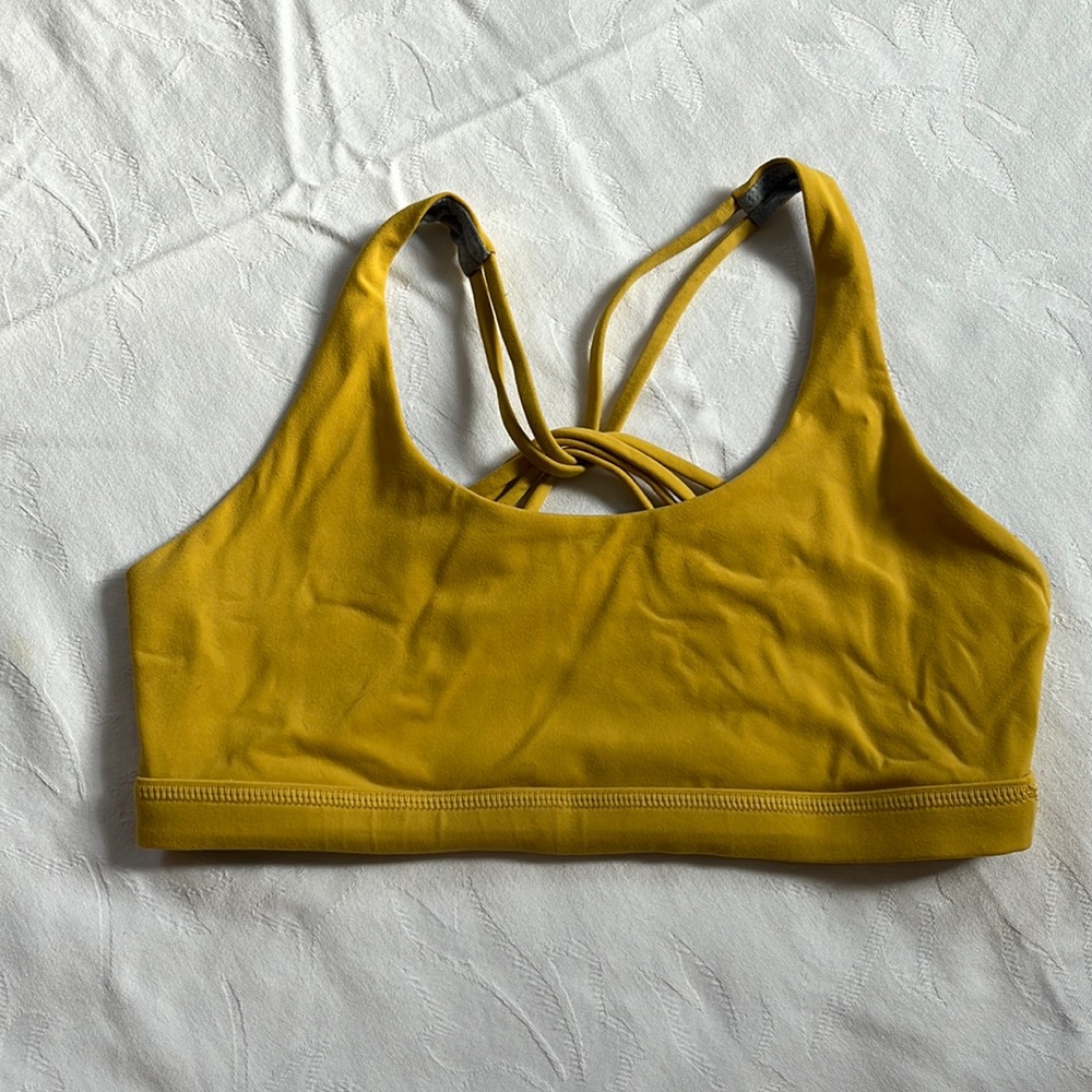 Born primitive mustard sports bra